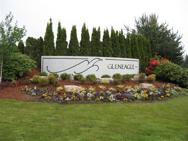 Landscaped GLENEAGLE entrance sign with decorative plantings